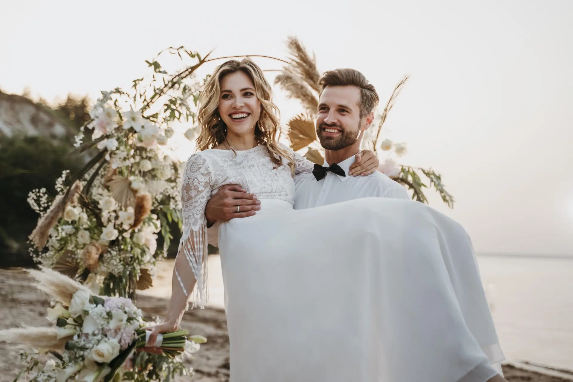 young bride groom having beach wedding scaled