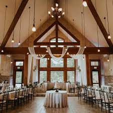 wedding party tables set up inside of Della Terra in Estes Park, CO